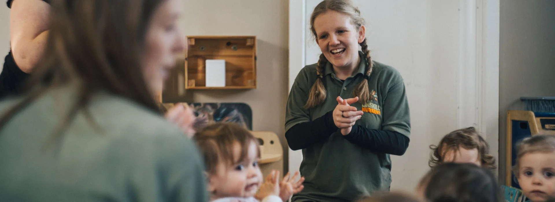 Teacher Laughing With Kids