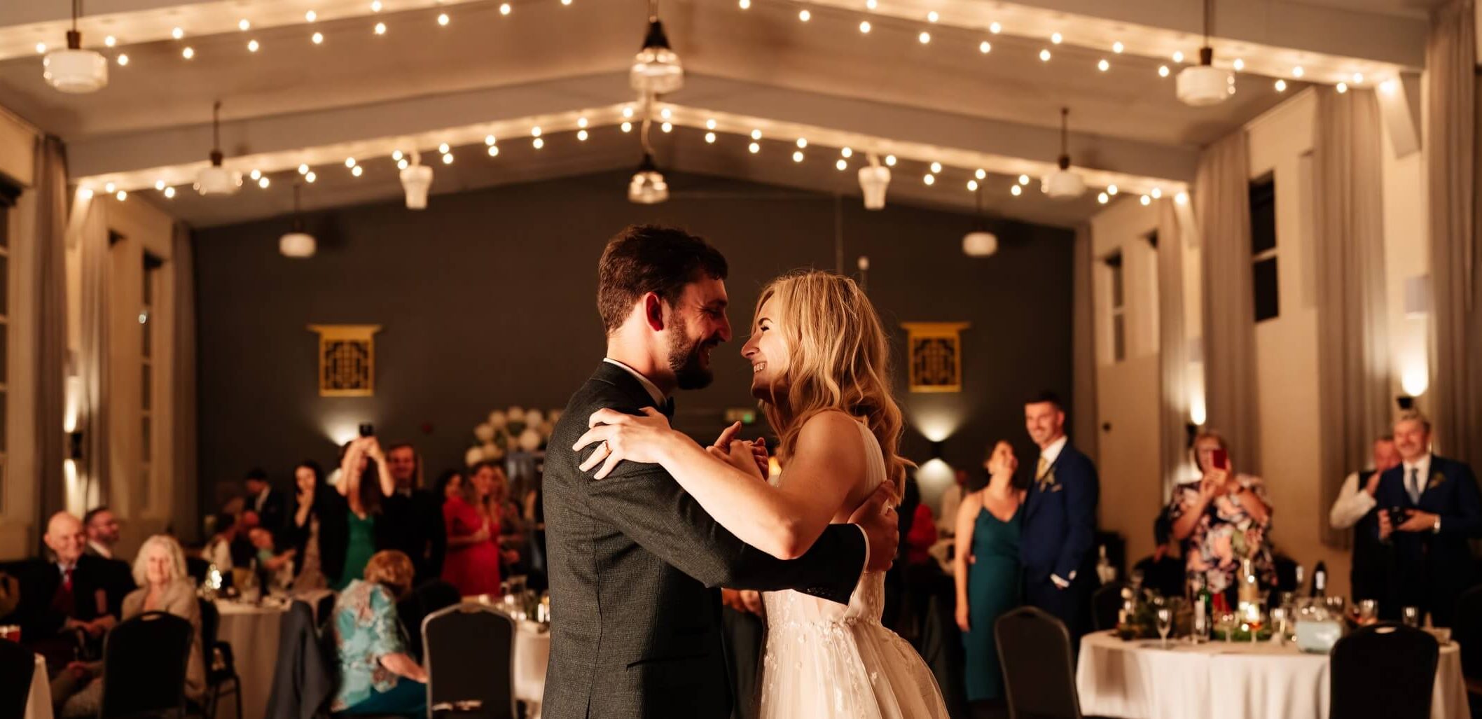 Bride and Groom Enjoying First Dance