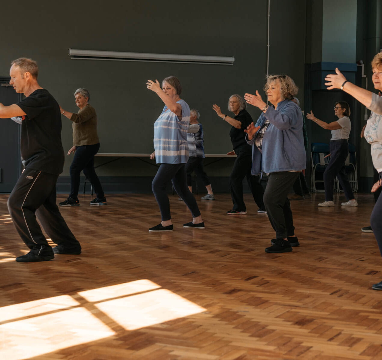 Group of Older People Doing Tai Chi