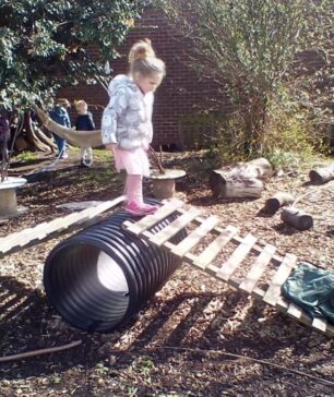 Girl Balancing In Play Area