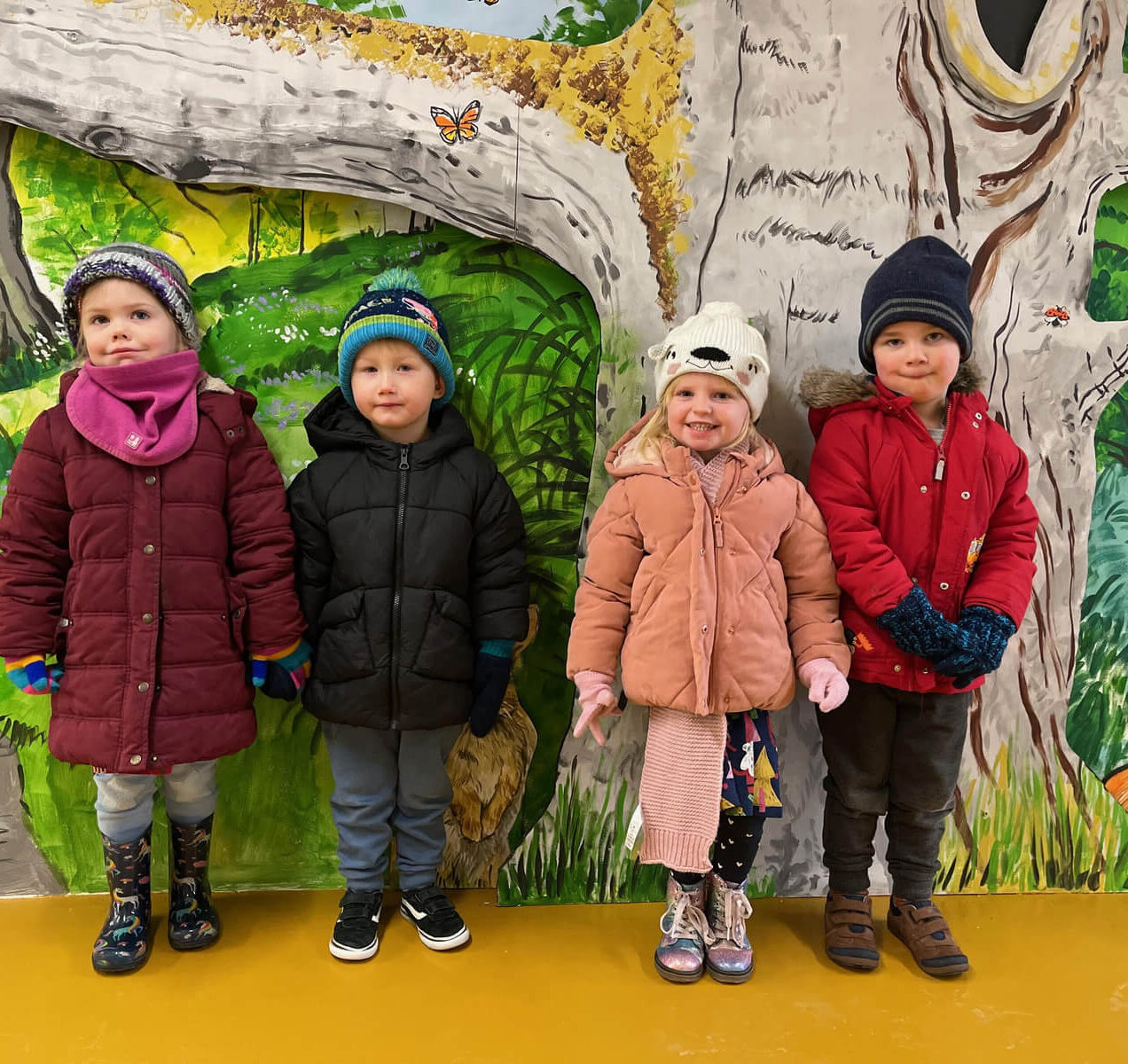 Four Children In Front of Forest Display